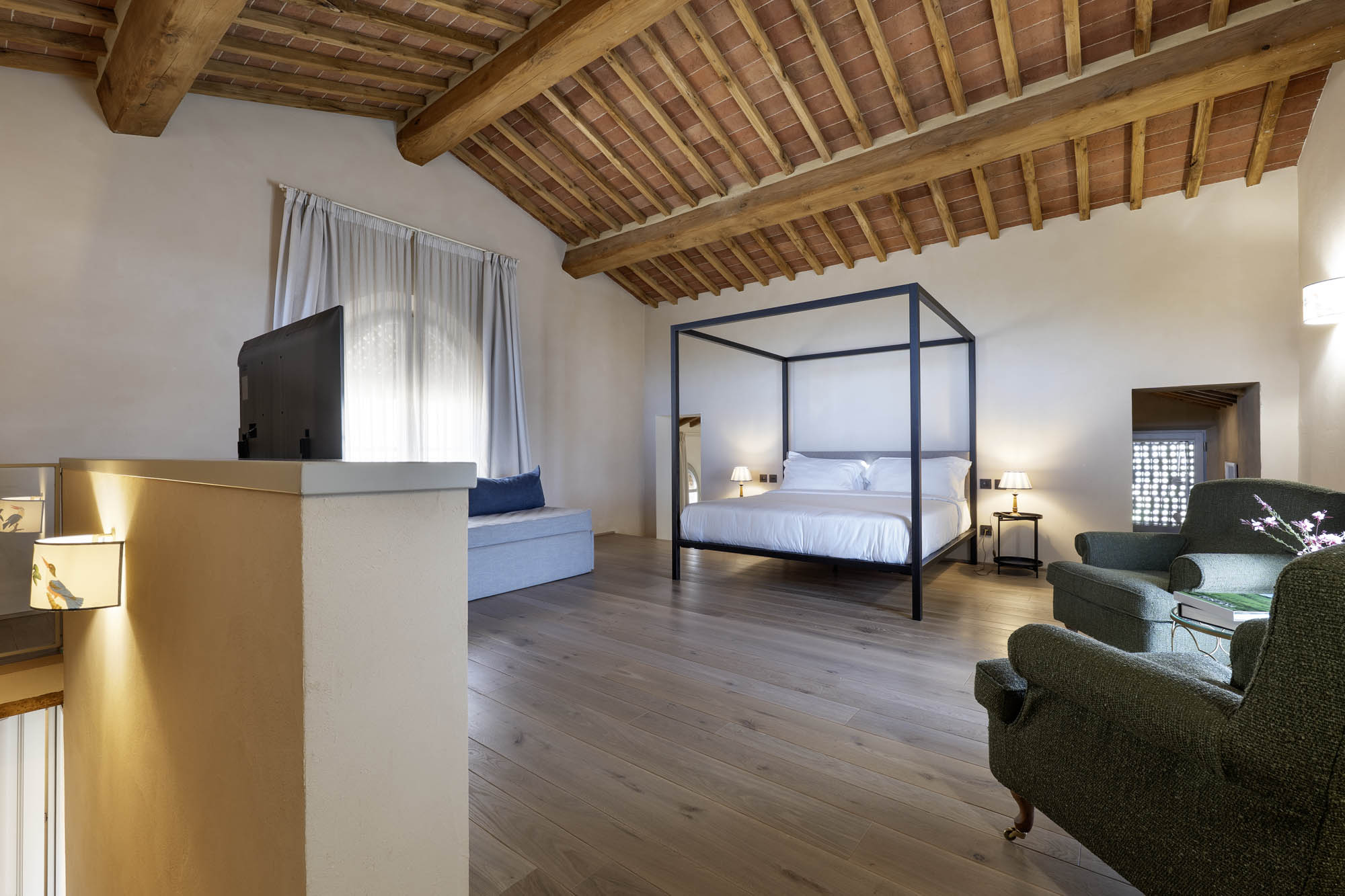 Il Cottage — la camera con letto a baldacchino nell'antico fienile